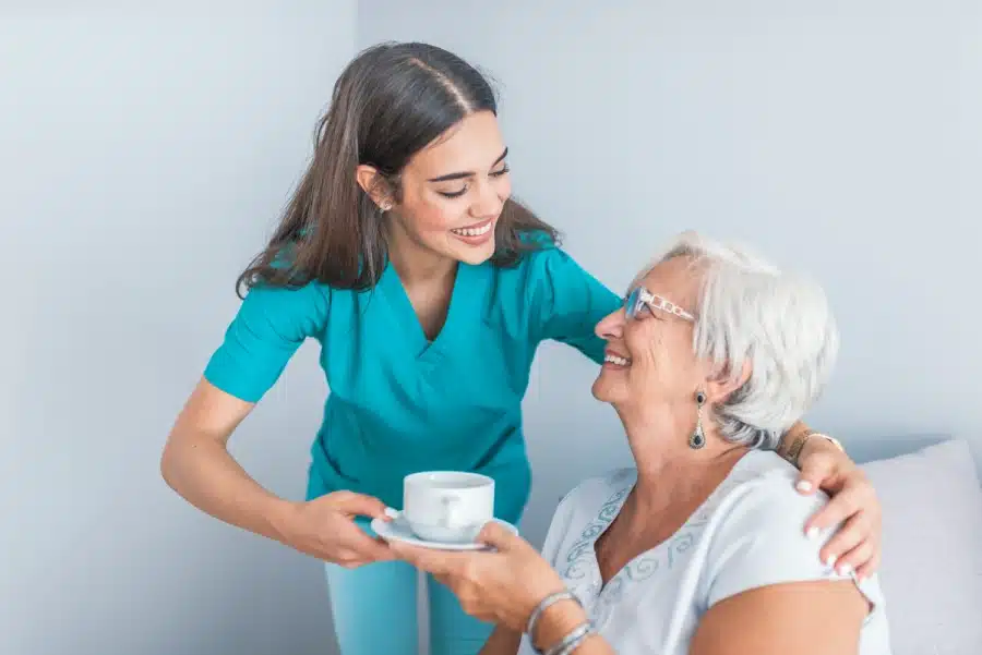 pretty helpful carer talking with female patient
